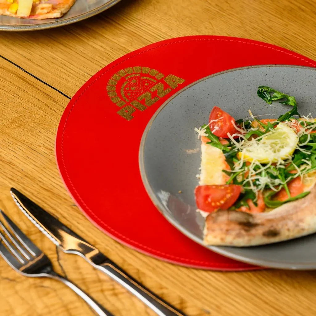 Luxurious Capri leather Circle-Shaped Placemat, ideal for creating an elegant dining atmosphere. Soft yet durable, it protects surfaces while adding sophistication.