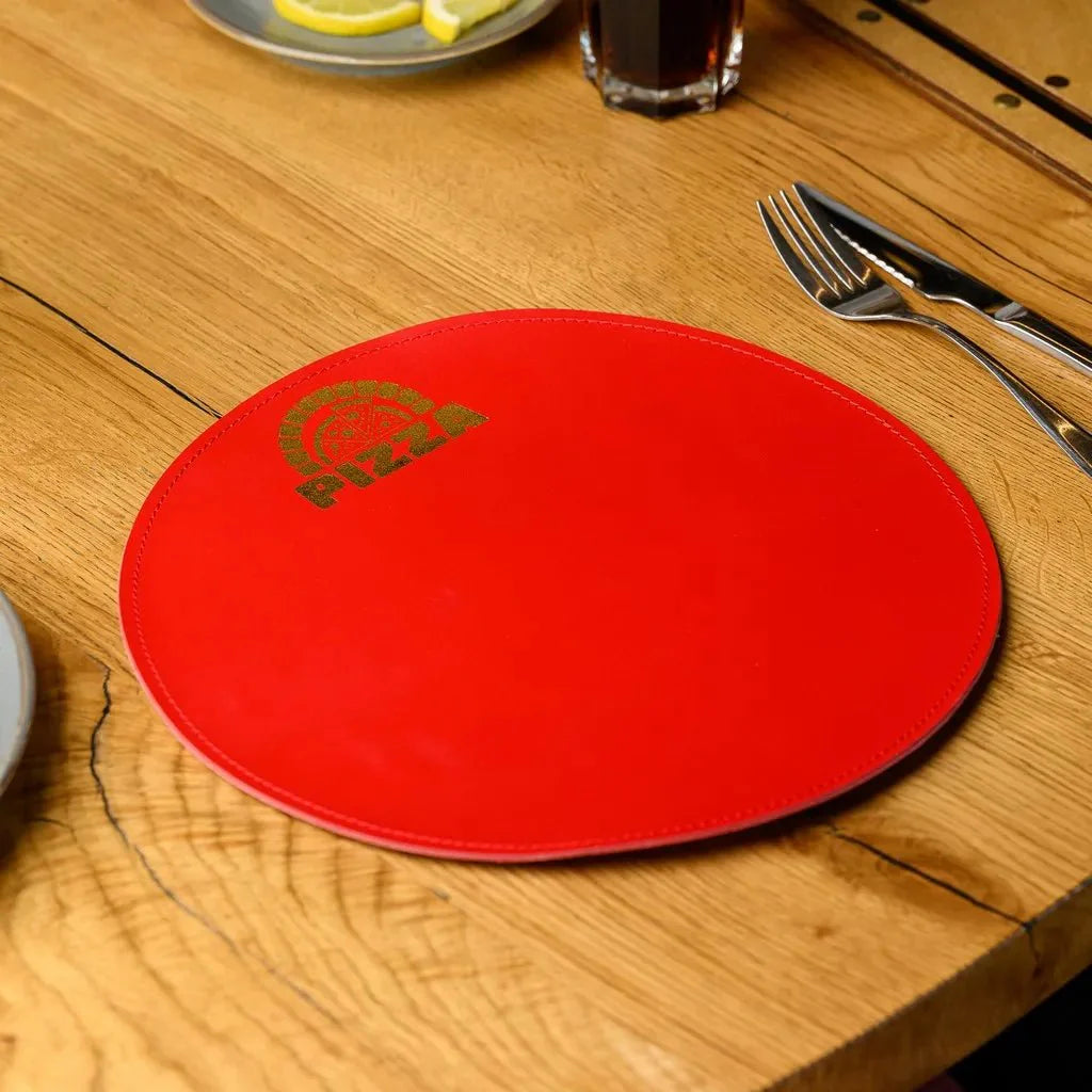 Circle-Shaped Placemat in Capri leather, designed for elegance and durability. Perfect for everyday dining or special occasions, adding a refined touch to any table setting.