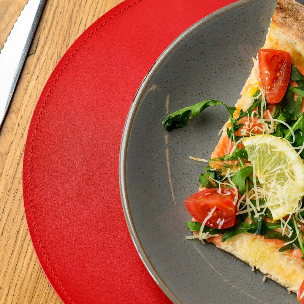 Handcrafted Circle-Shaped Placemat in Capri leather, offering a blend of durability and luxury. Ideal for protecting surfaces while enhancing your table’s aesthetic.