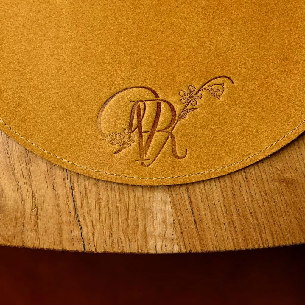 Stylish and durable Circle-Shaped Placemat made from premium Crazy Horse leather. A refined choice for protecting surfaces while adding character to your dining table.