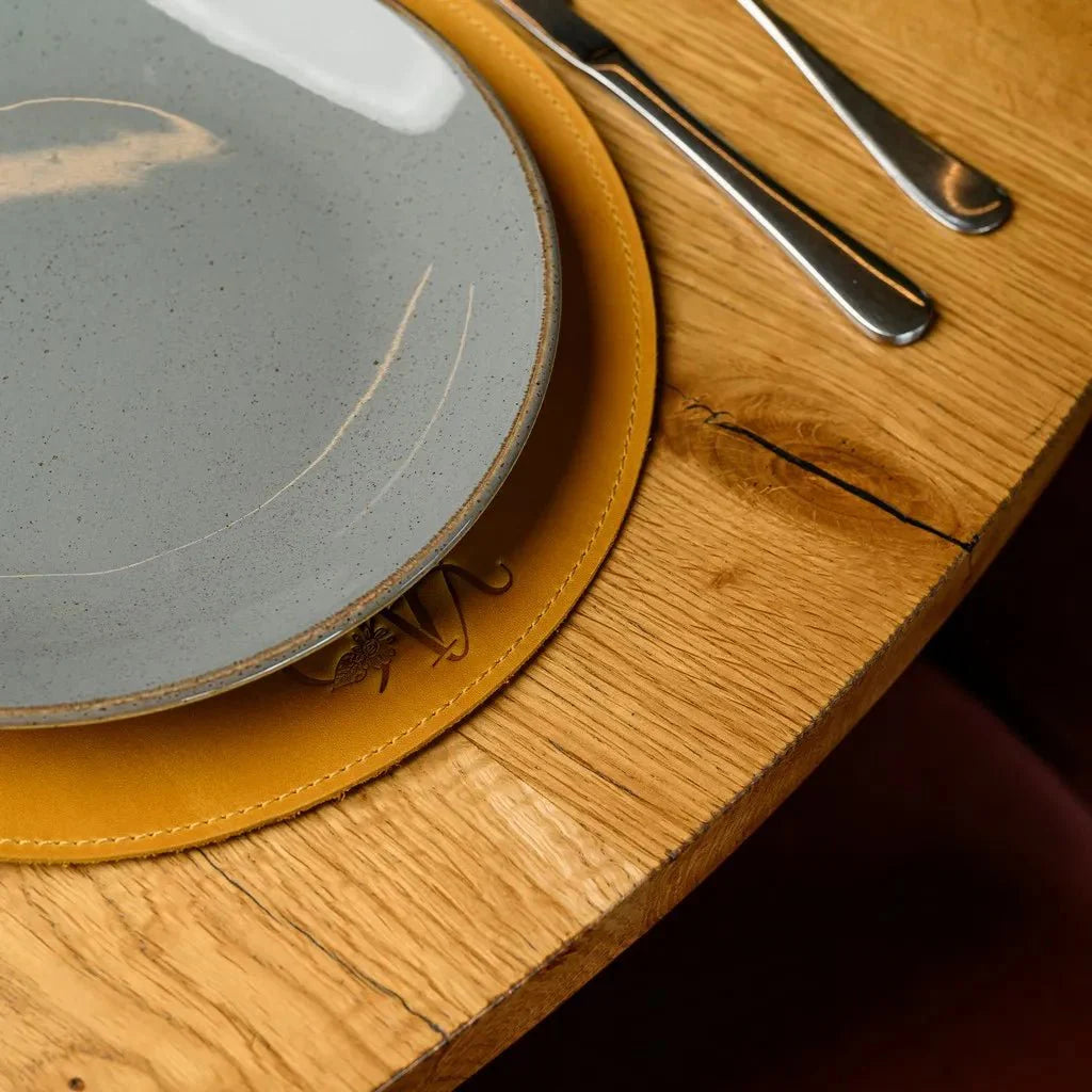 Vintage-inspired Crazy Horse leather Circle-Shaped Placemat, perfect for adding an elegant yet rugged charm to any dining space. Built to last with a distinctive patina.