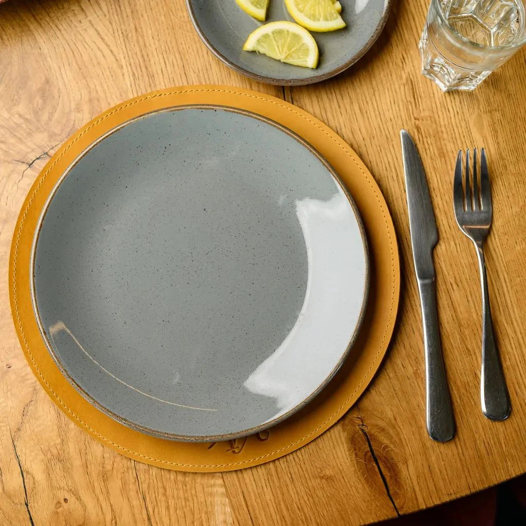 Beautifully crafted Crazy Horse leather Circle-Shaped Placemat, offering a combination of durability and style. Ideal for adding warmth and texture to any dining setup.