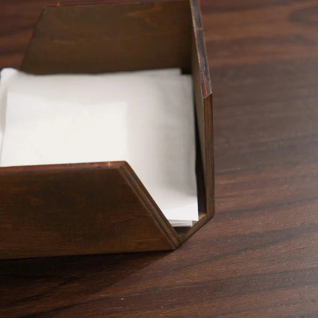 Stylish wooden napkin dispenser for restaurants and cafés.