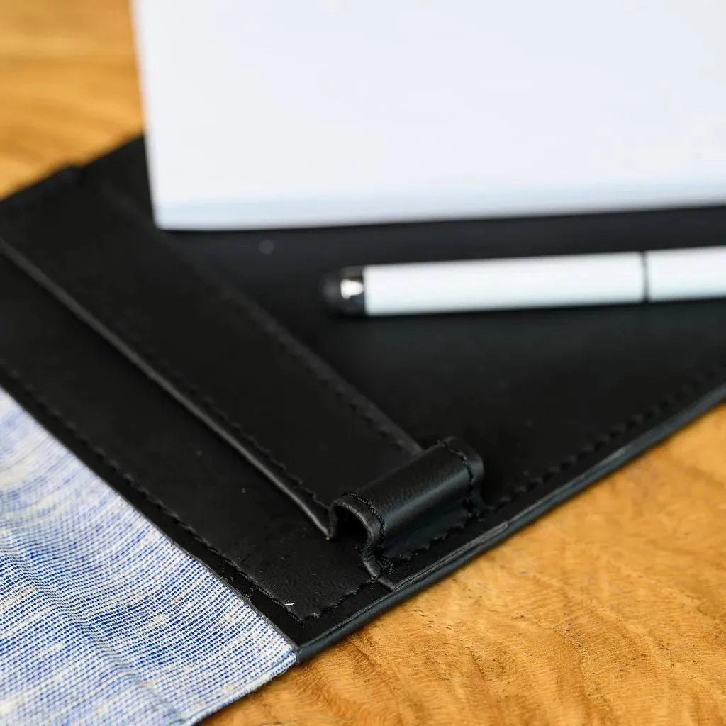 Fabric notebook, with a reinforced hardcover, made for waiter use. The notebook is built to last, and look professional. The design is made to assist in keeping organized orders.