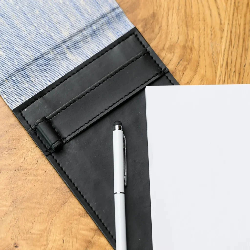 Hardcover fabric notepad, a vital tool for any waiter. The notebooks construction allows for easy, and reliable notetaking. The fabric gives a professional feel, and the hard cover protects the notes.