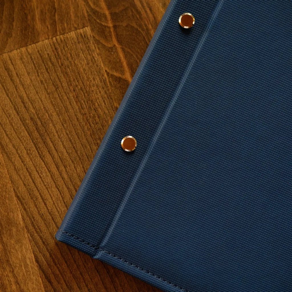 Luxury Brown Faux Leather Menu Cover with Textured Finish | A stylish and durable faux leather menu cover with a rich brown color and textured finish, offering a premium feel for fine dining establishments and bistros.