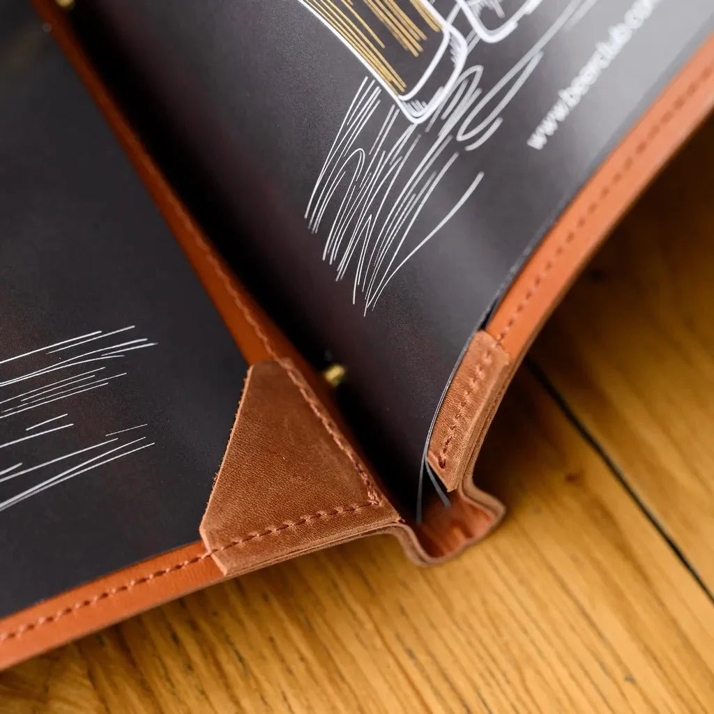 Custom menu cover with unique stitched accents.