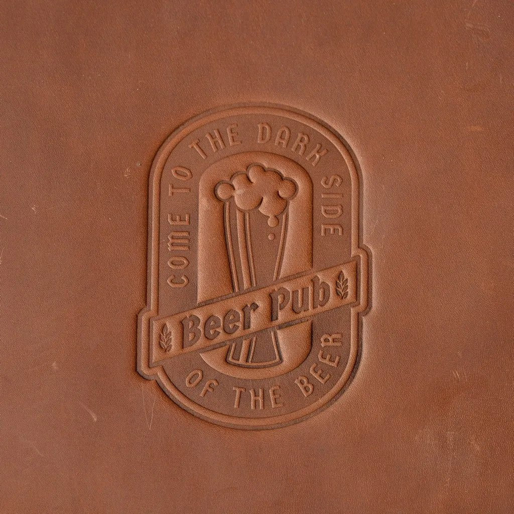 Handcrafted menu covers with a stylish leather exterior.