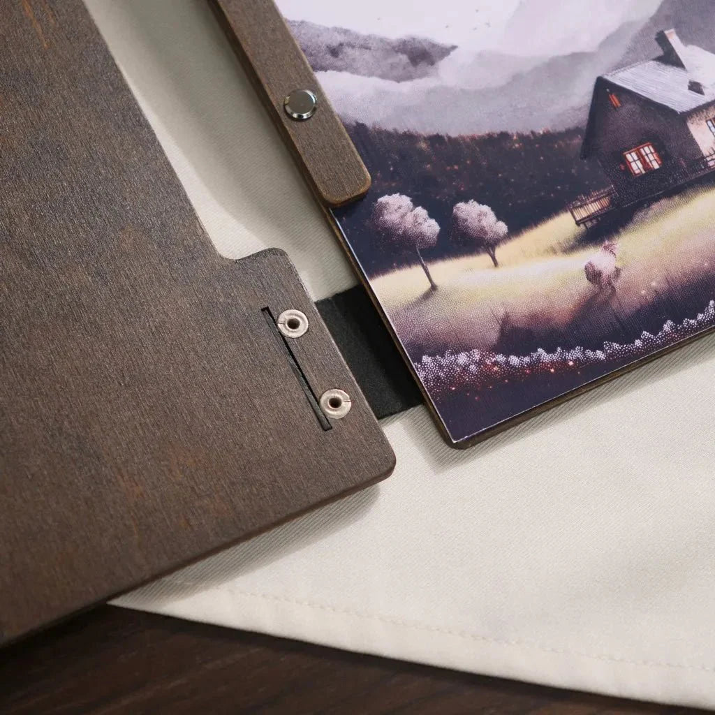 Unique wood menu folder with custom engraved details.