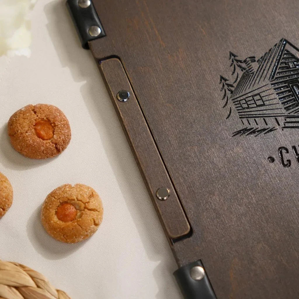 Handcrafted wood menu holder with personalized engraving.