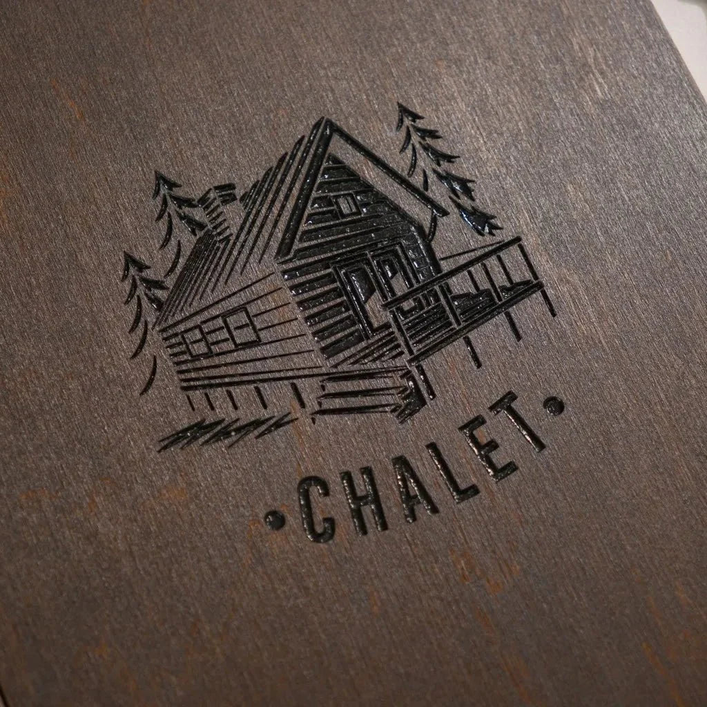 Luxury wooden menu board with deep-cut logo engraving.