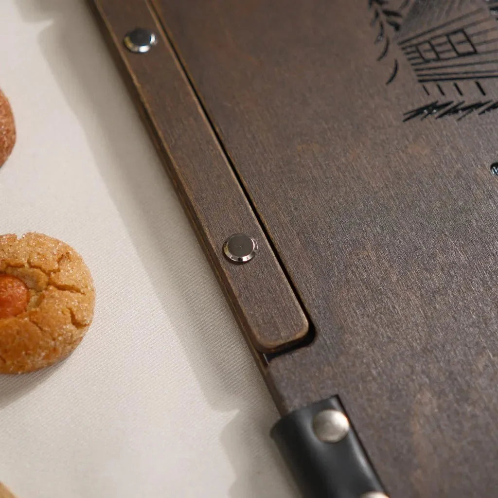 Elegant wood menu book with laser-engraved branding.