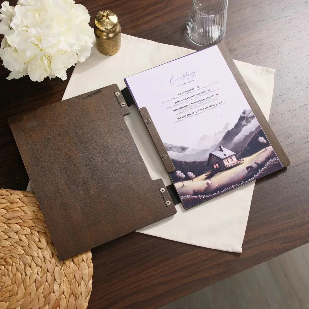 Sophisticated restaurant menu cover with custom wood engraving.