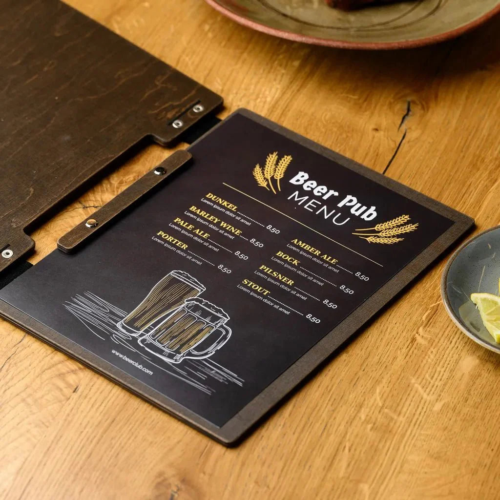 Elegant wooden restaurant menu book with personalized engraving.