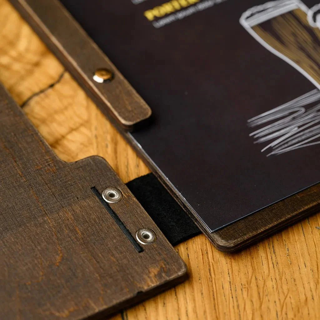 Stylish covers restaurant menu made from high-quality wood.