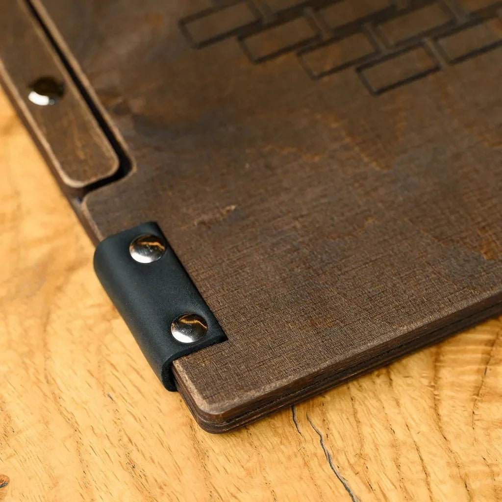 Durable wooden menu books for restaurants with sleek edges.