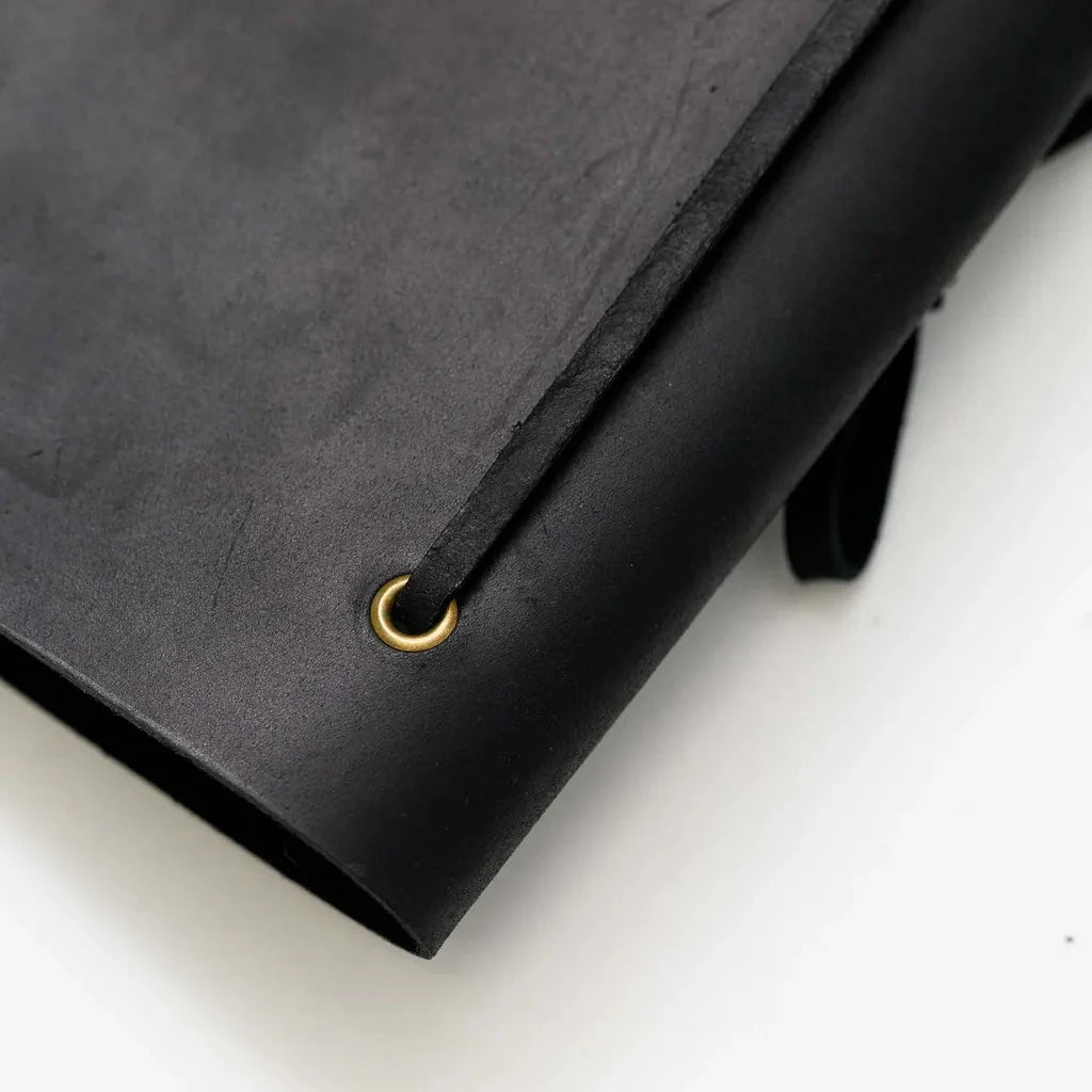 Personalized leather menu covers for exclusive venues.
