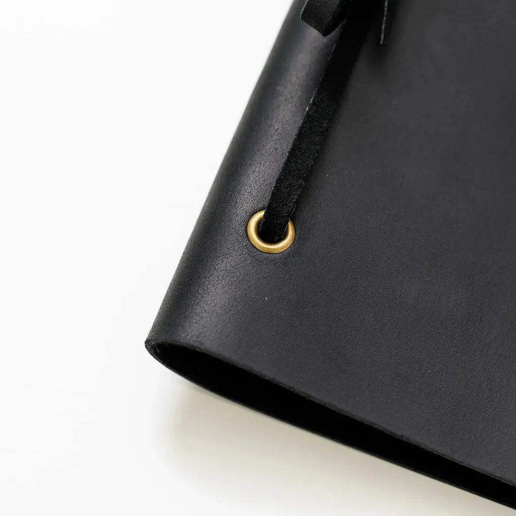 Handcrafted custom menu covers for fine dining.