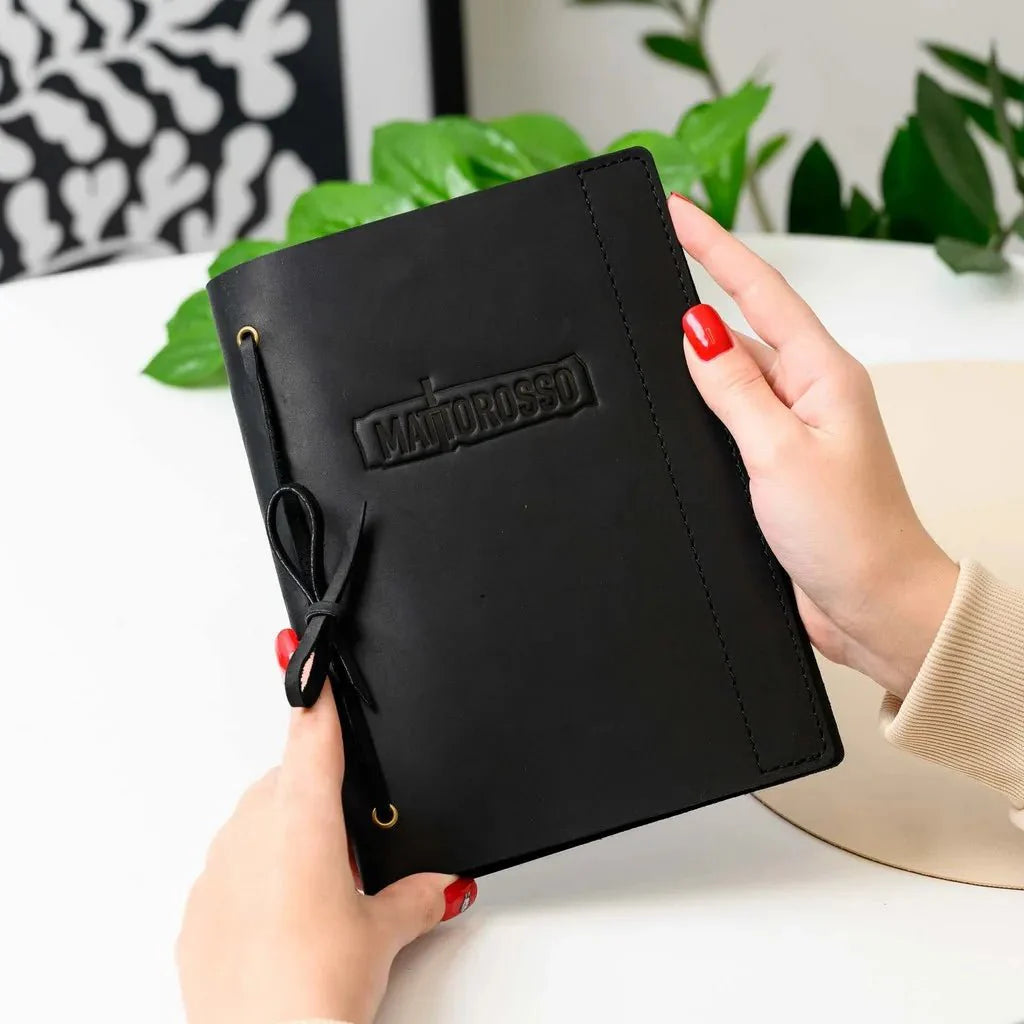 Modern book menu wrapped in genuine leather.