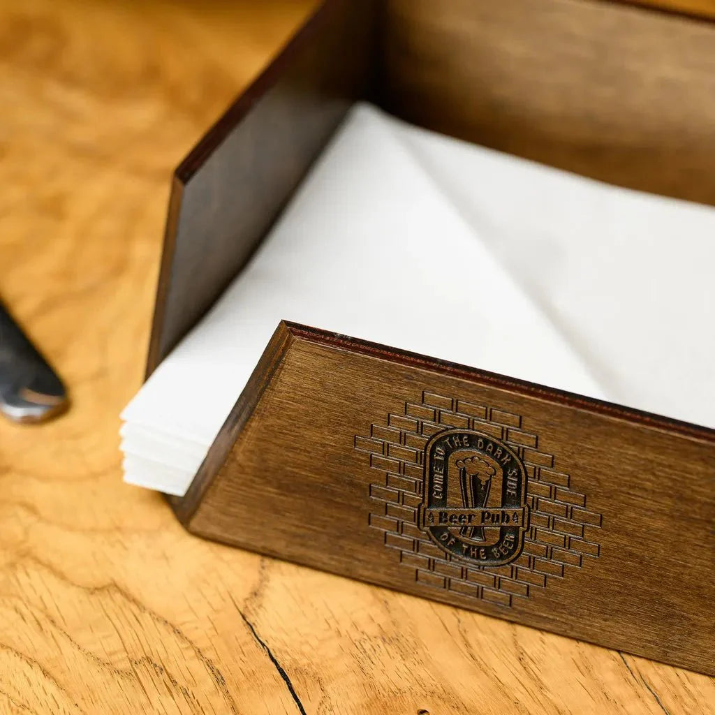 Chic wooden napkin holder for elegant table settings.