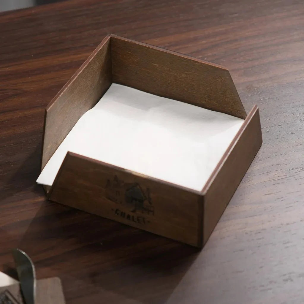 Customizable wooden napkin display for restaurant branding.