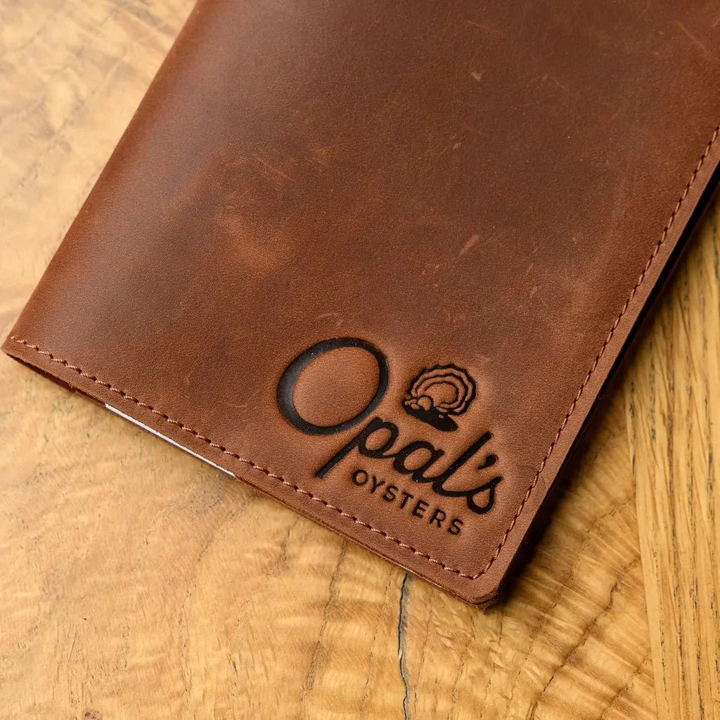 Rustic-style Crazy Horse leather notebook for waiters, featuring a durable design and compact size for easy carrying.