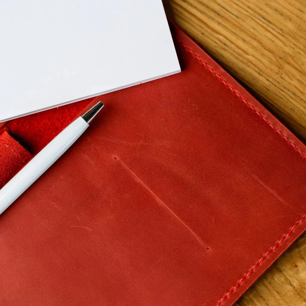 Handmade Crazy Horse leather notebook for restaurant staff, featuring a vintage look and a closure to keep order notes securely in place.