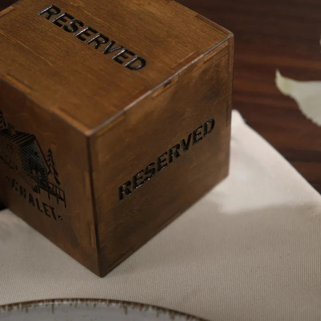 Stylish engraved wood reserved sign for upscale dining.