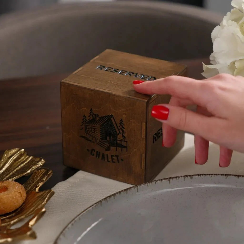 Elegant wooden tabletop reserved plate with laser etching.