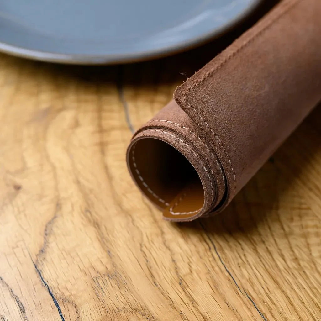 Rectangular placemat in Capri leather with customizable debossing option.