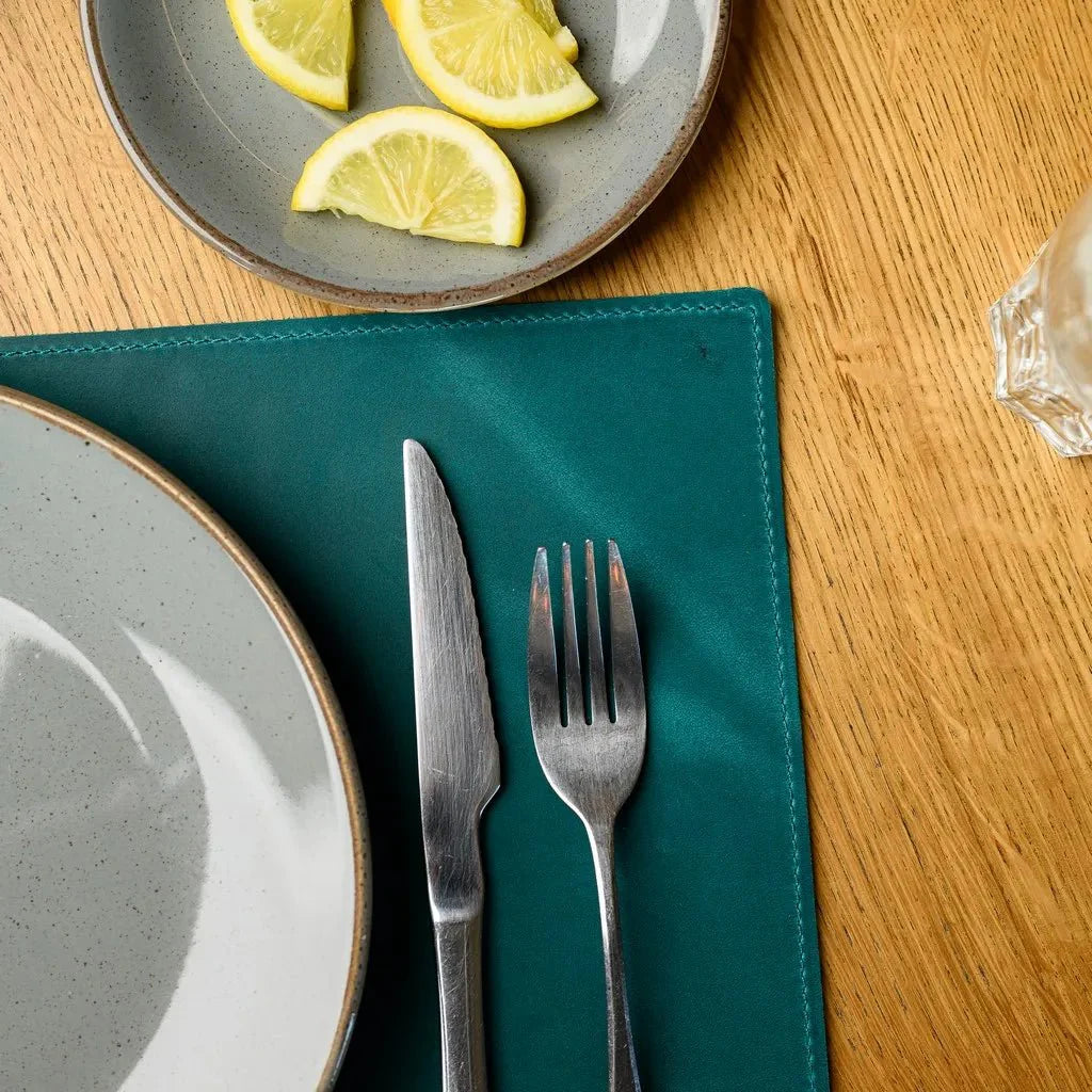 Handmade rectangular placemat crafted from Crazy Horse leather, featuring a classic design that complements any dining or workspace décor.