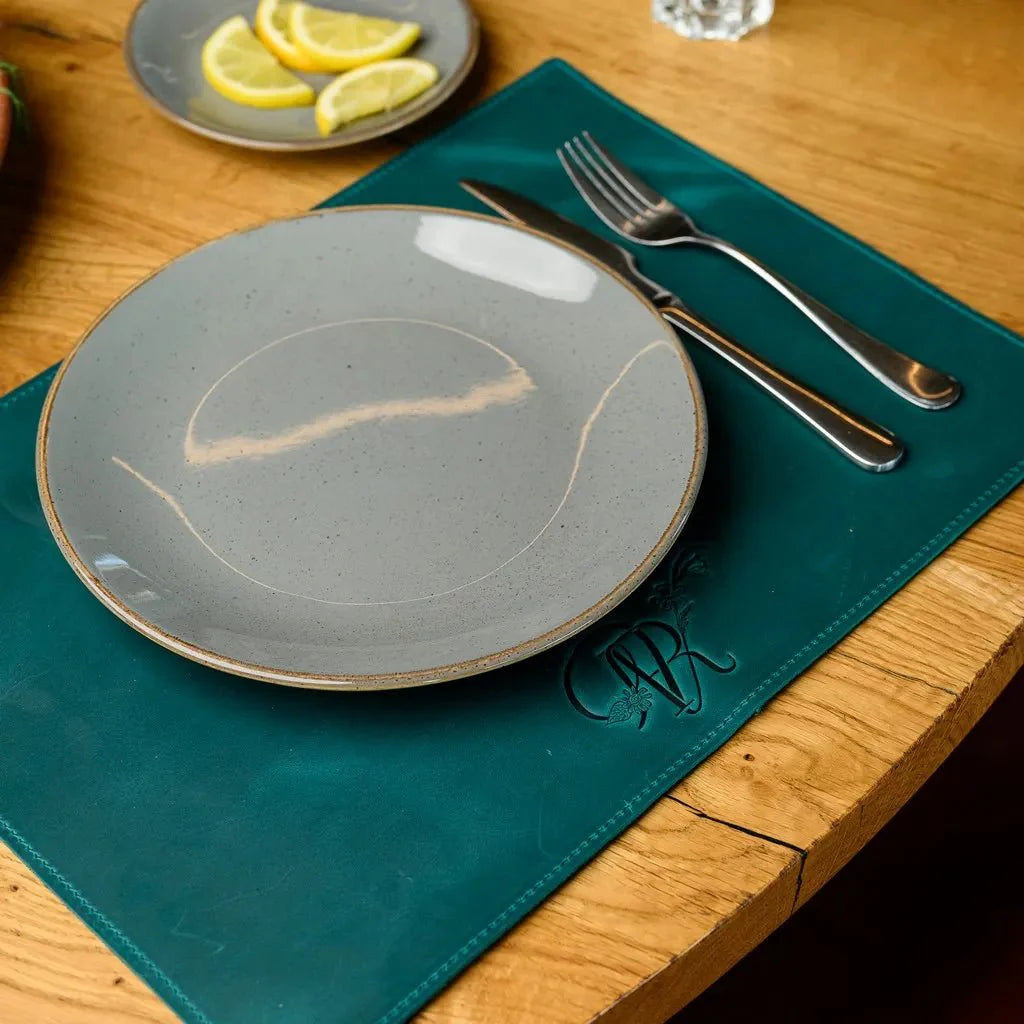 Protective leather placemat made from Crazy Horse leather, shielding surfaces from damage while enhancing table aesthetics.