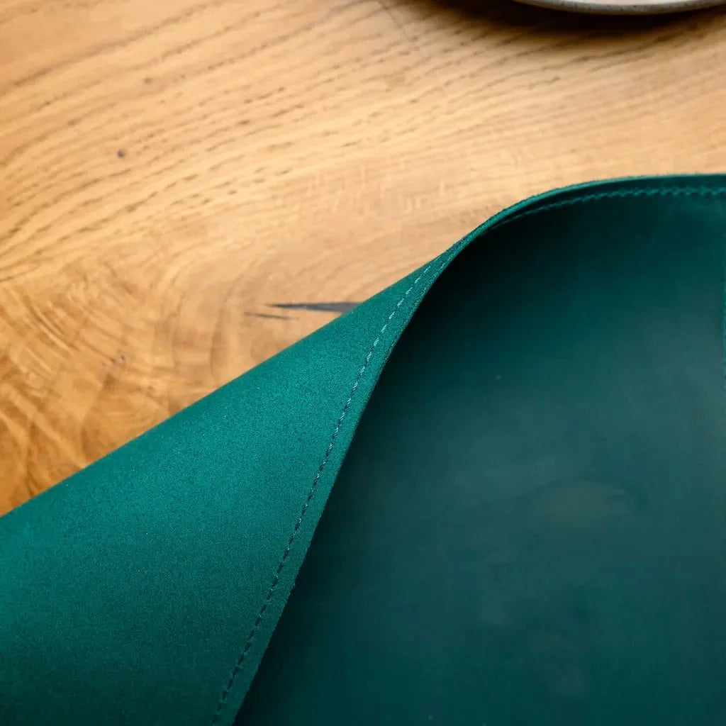 Close-up view of the premium Crazy Horse leather placemat, showcasing its rich texture and sophisticated, high-quality craftsmanship.