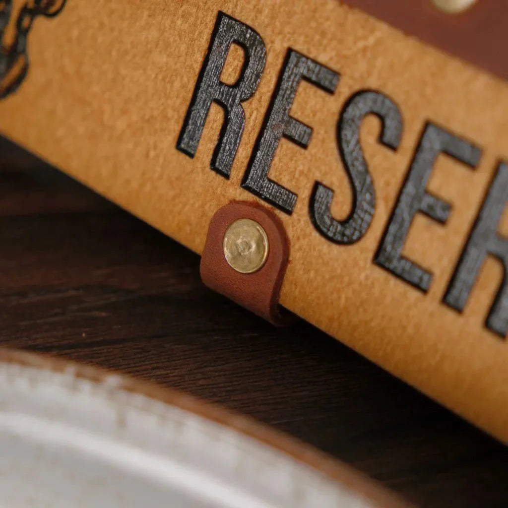 Premium quality wooden tabletop reserve plate with a refined finish.