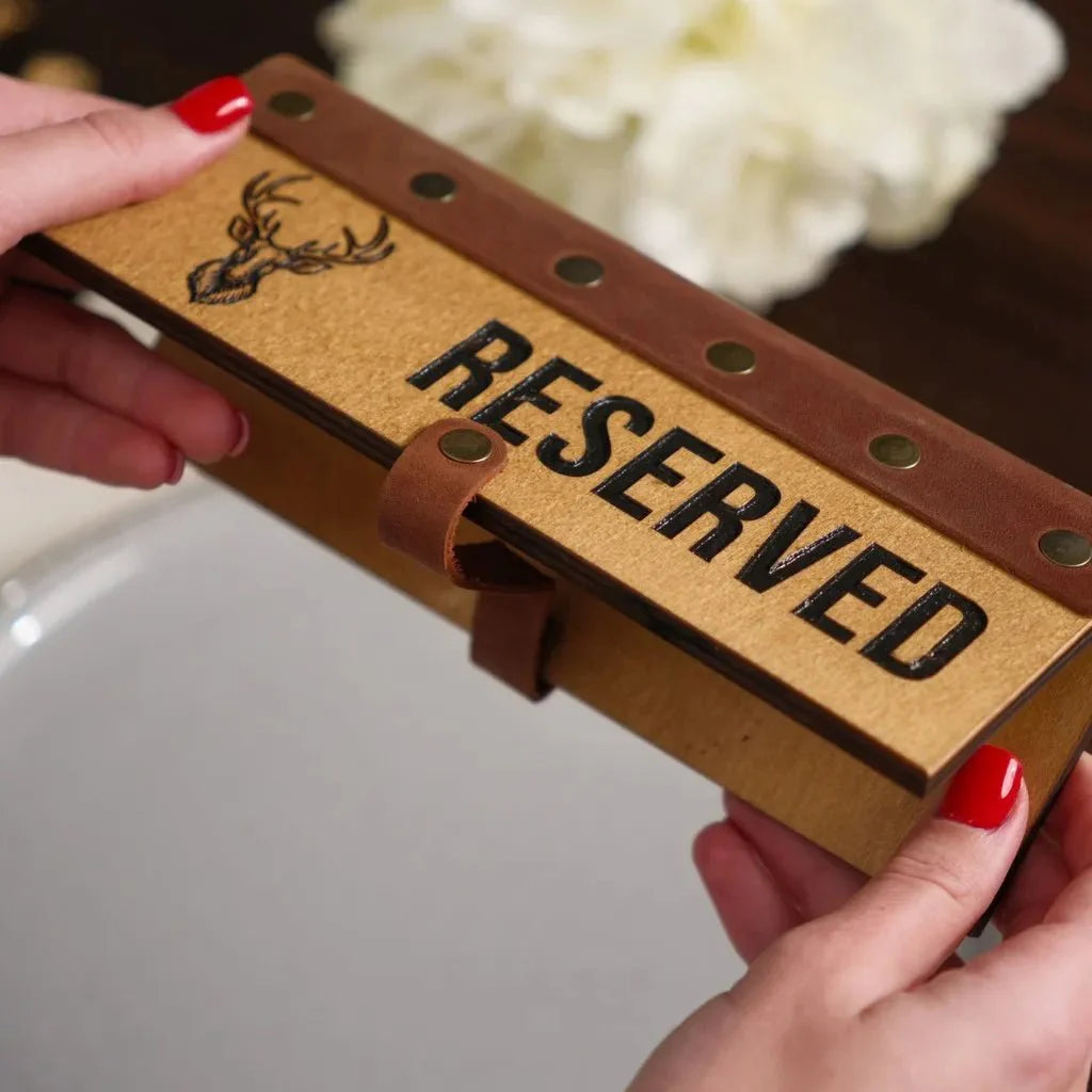 High-quality wooden tabletop reserve plate for fine dining venues.