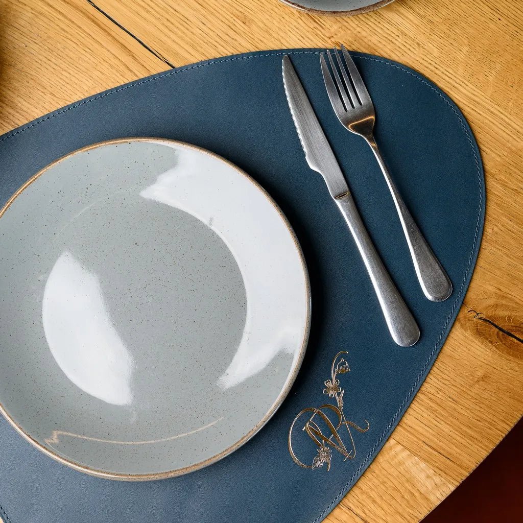 High-quality Teardrop-Shaped Placemat made from Capri leather. A perfect combination of durability and elegance, designed to complement any dining table.