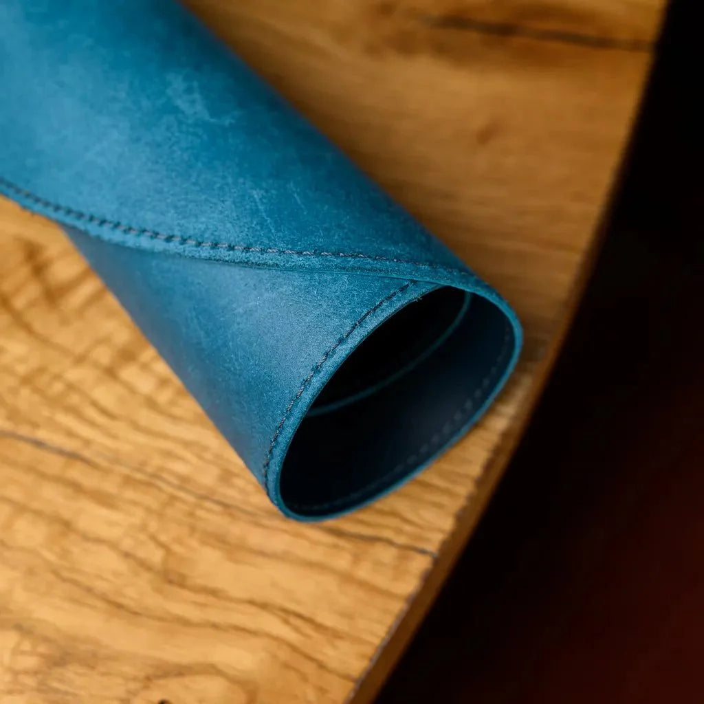 Beautifully designed Teardrop-Shaped Placemat in Capri leather, offering a premium dining experience. Durable, water-resistant, and easy to wipe clean after meals.