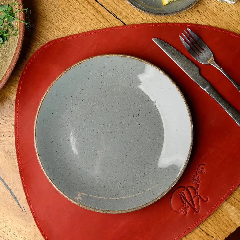 Teardrop Crazy Horse leather placemat, featuring a distressed patina that evolves over time. Adds warmth, character, and a premium touch to your dining experience.