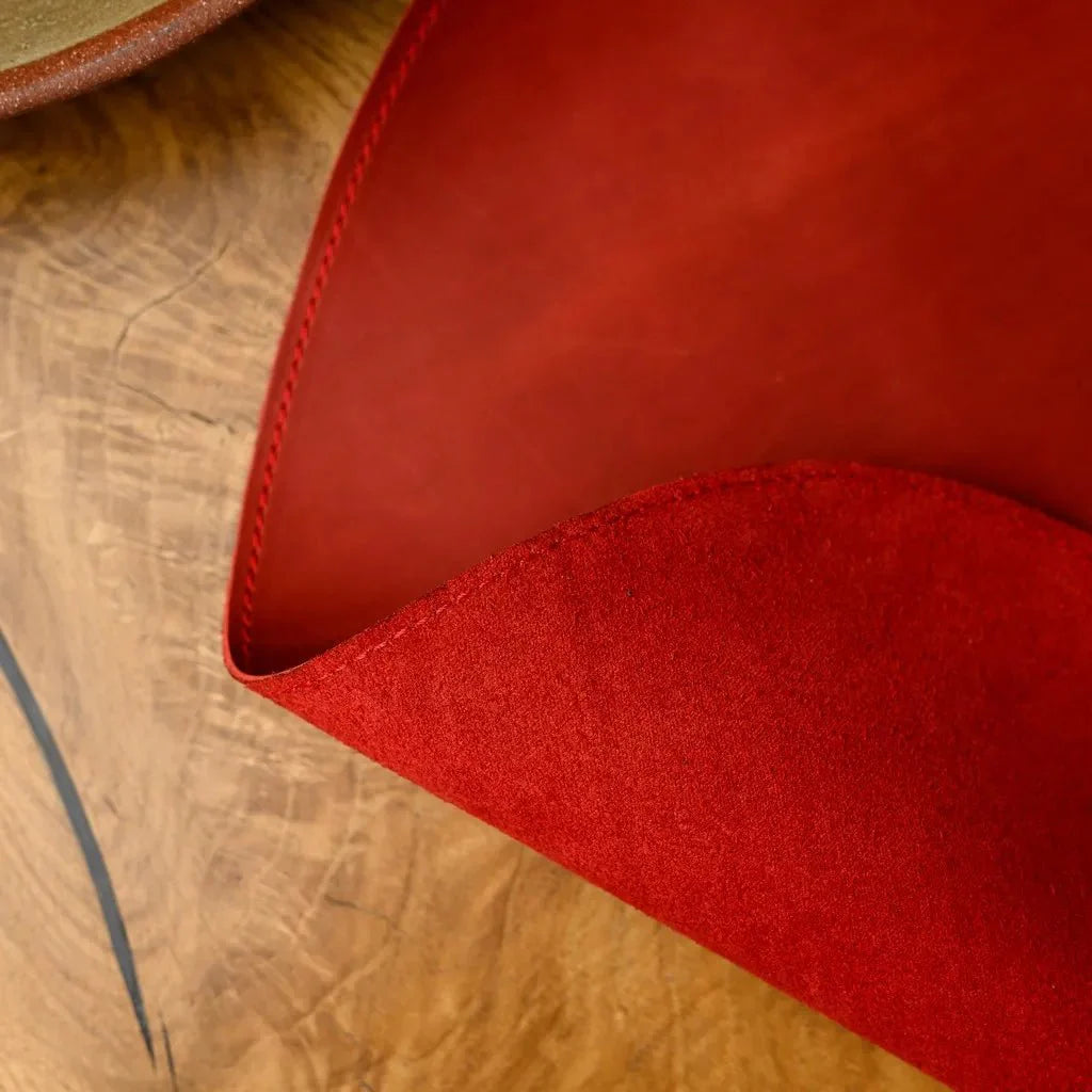 Vintage-style teardrop leather placemat, crafted from Crazy Horse leather for an aged, sophisticated look. Complements farmhouse, loft, and industrial decor themes.