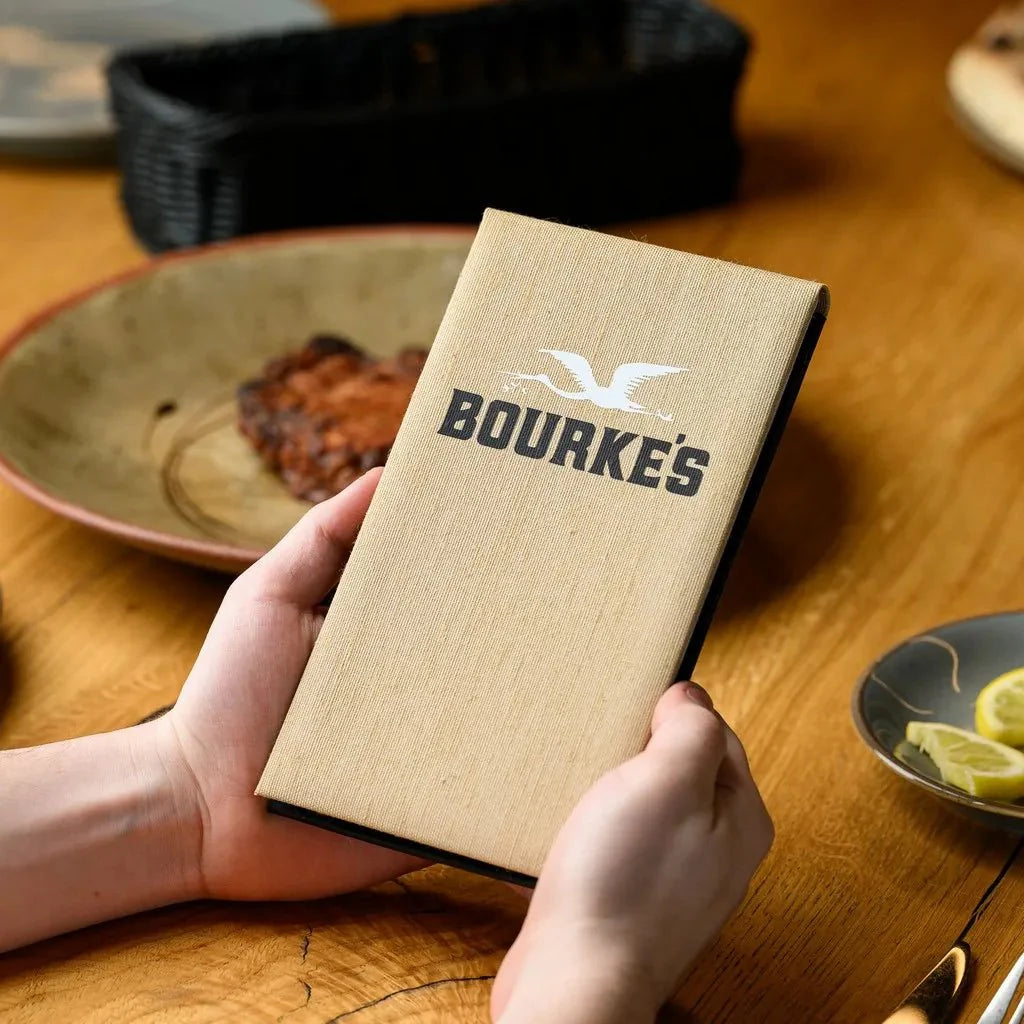 Functional and stylish Textile Notebook with a hardcover back, providing waiters with an elegant and durable tool for staying organized while maintaining a professional appearance during service.