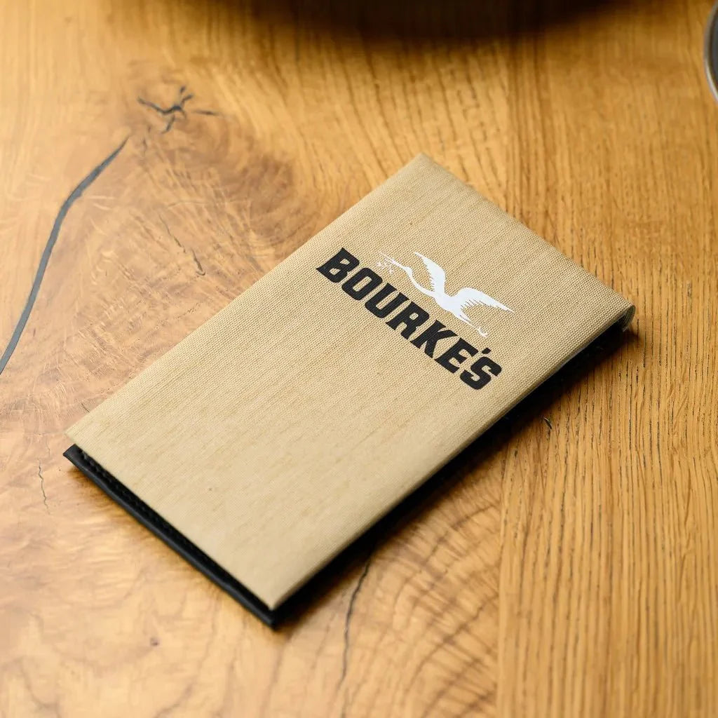 High-performance Textile Notebook with a hardcover back, designed for waiters to stay organized and efficient. A perfect companion for busy hospitality environments such as restaurants and bars.