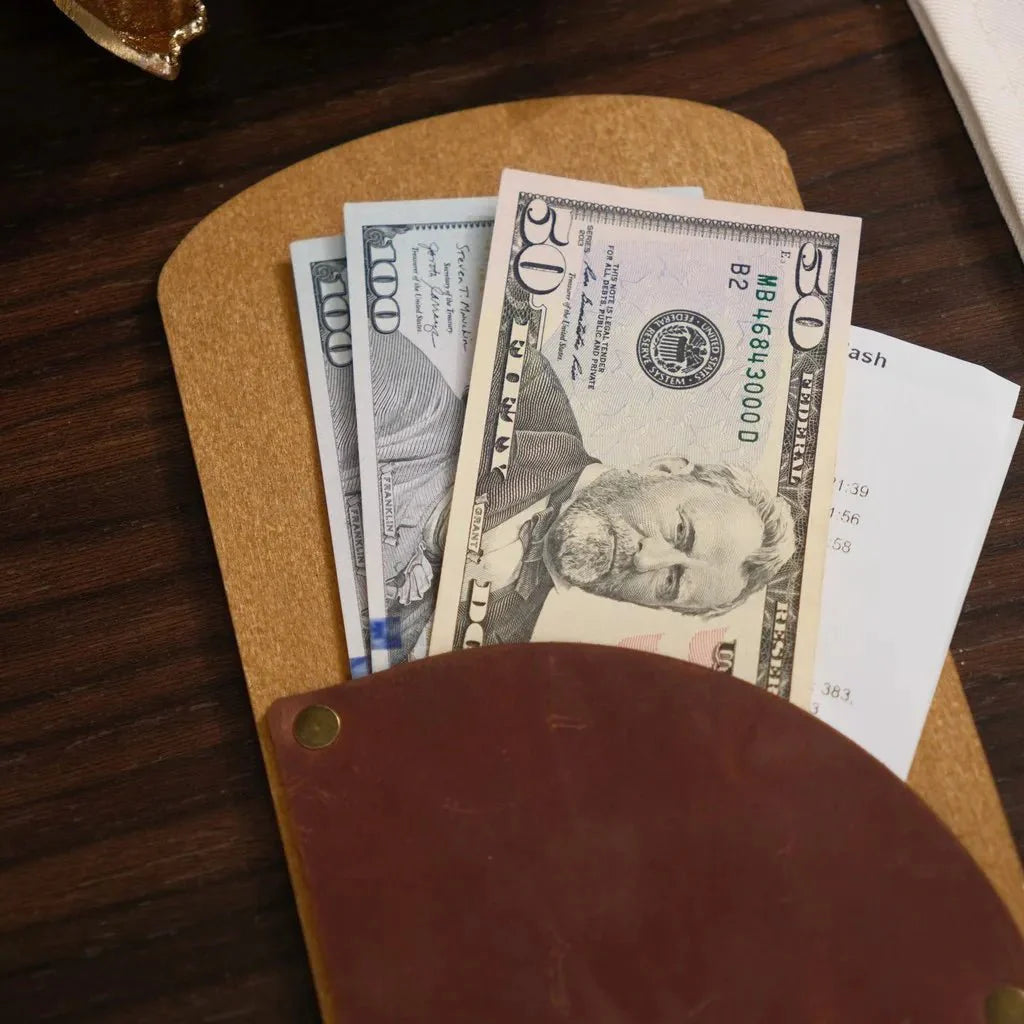 Classic wooden check holder with a natural wood grain.