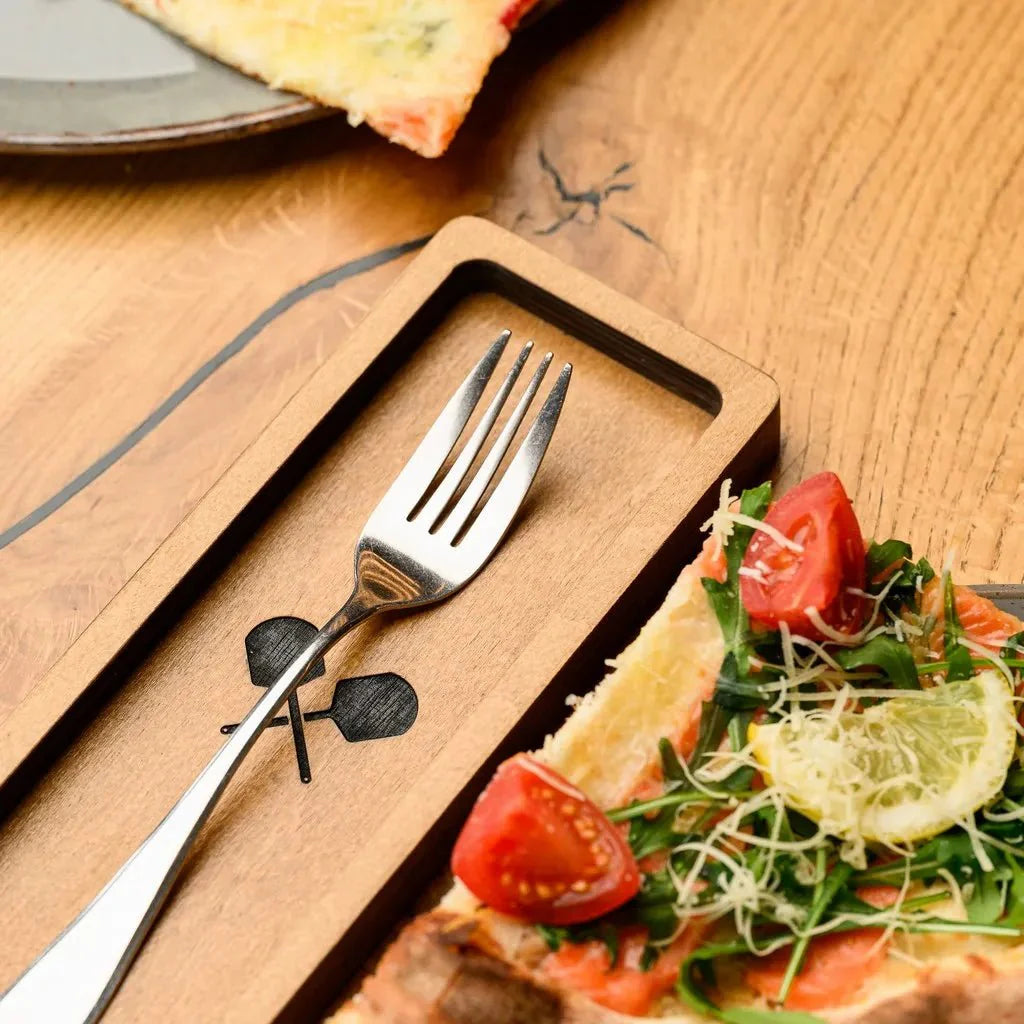 Handcrafted wooden cutlery holder with a natural wood finish.