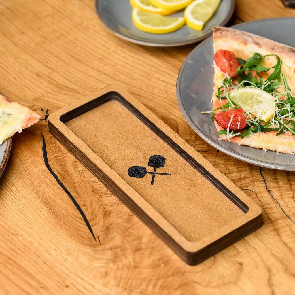 Chic wooden cutlery holder for upscale dining settings.