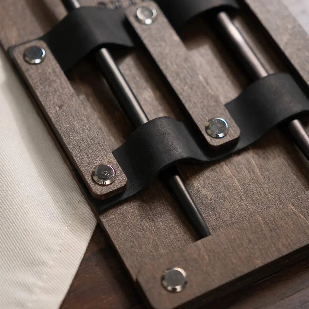 Stylish engraved wooden flatware holder for upscale dining.