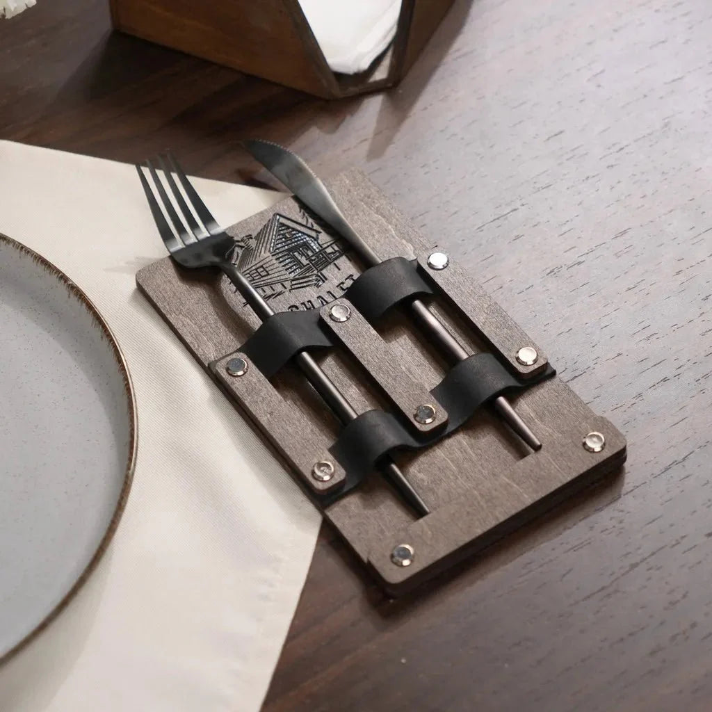 Elegant wood utensil organizer with laser-etched branding.
