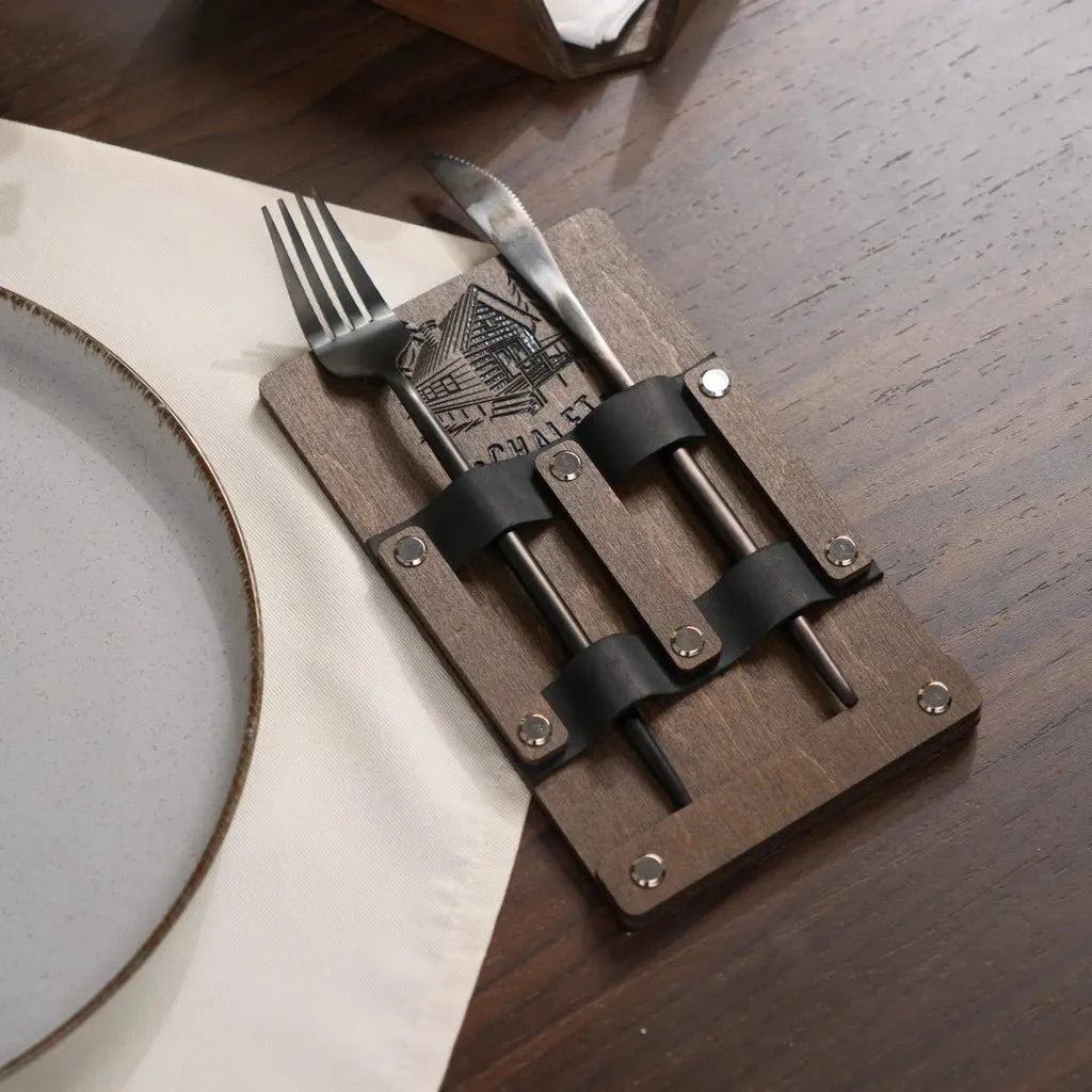 Luxury engraved wooden knife and fork holder for fine dining.