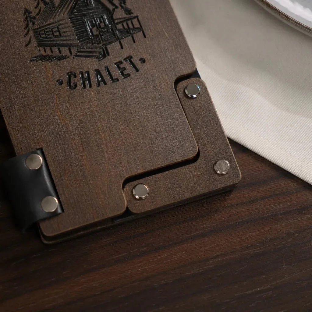 Unique wooden receipt holder with custom engraved details.