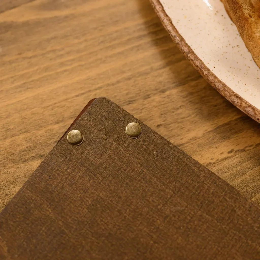 Rustic custom menu covers with vintage appeal.