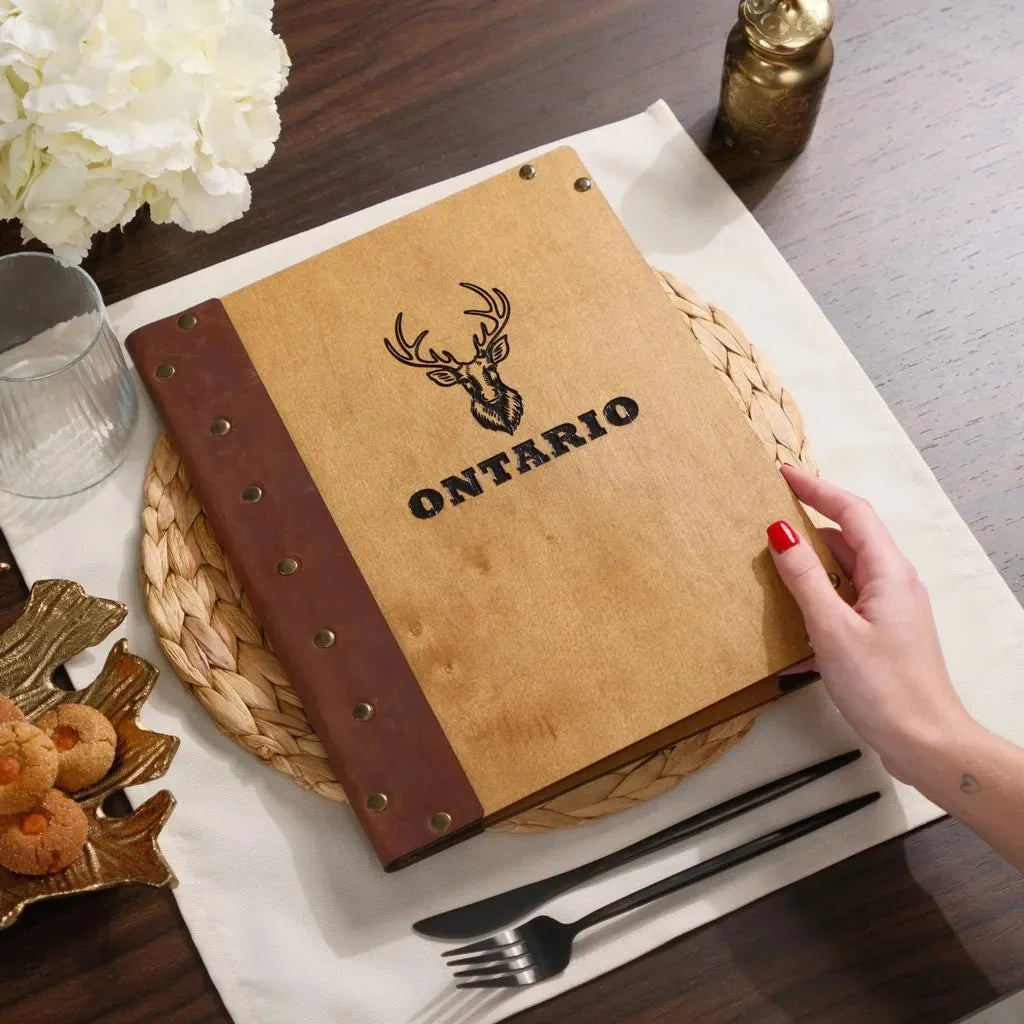 Sleek restaurant menu books with a minimalist design.